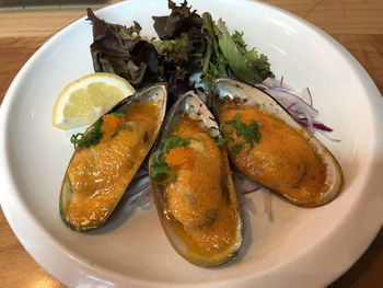 High angle view of fish in plate on table