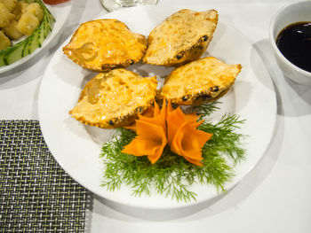 High angle view of food served on table