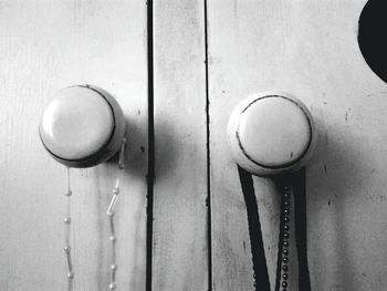 Close-up of metallic objects on wood