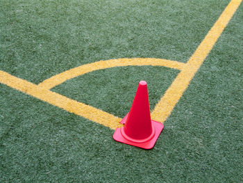 Close-up of red ball on field