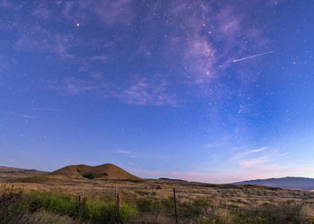 Scenic view of star field against sky at night