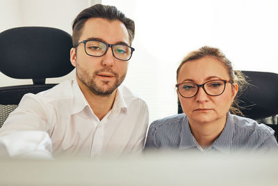 Business people working together looking at computer screen. teamwork and coworking at work