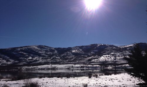 Scenic view of snow covered mountains