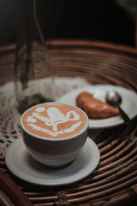 Close-up of cappuccino on table