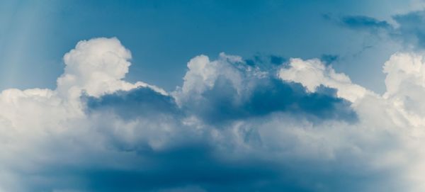 Low angle view of clouds in blue sky