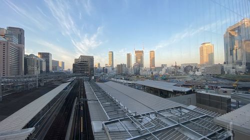 Panoramic view of city buildings against sky