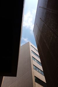 Low angle view of skyscrapers against sky