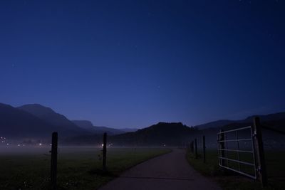 Scenic view of mountains against sky at night