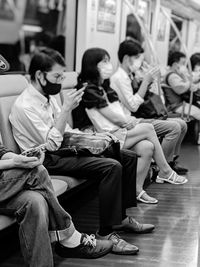 Group of people sitting on seat