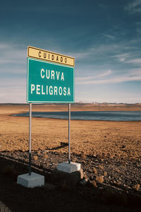 A spanish sign showing curva peligrosa in the mountains in peru