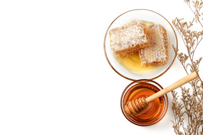 High angle view of breakfast on table against white background