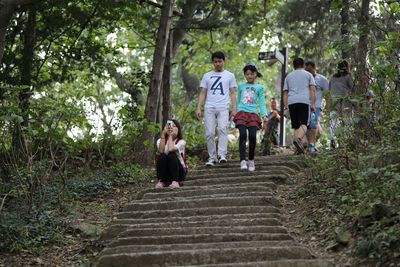 People walking in forest