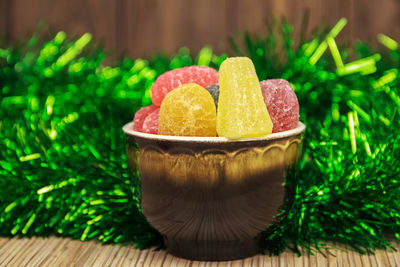 Close-up of fruits in bowl on table