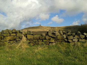 View of landscape against cloudy sky