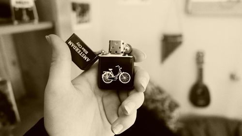 Close-up of woman photographing through camera