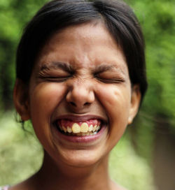 Close-up portrait of smiling boy