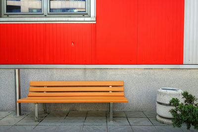 Red window on brick wall