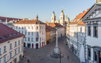 View of buildings against sky in city