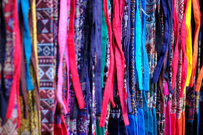 Full frame shot of clothes hanging in store