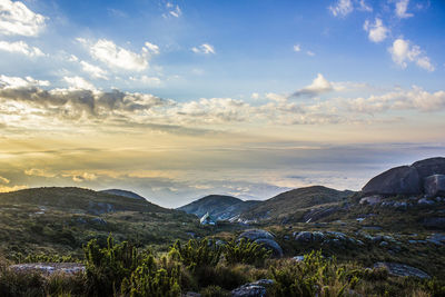 Scenic view of landscape against sky during sunset