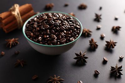 Close-up of coffee beans on table