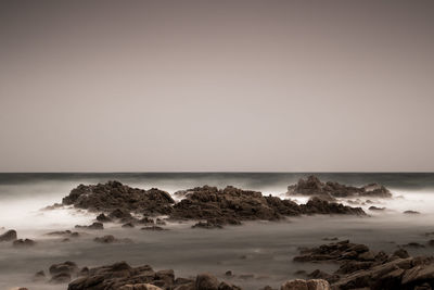 Scenic view of sea against clear sky