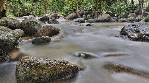 Close-up of rocks in water