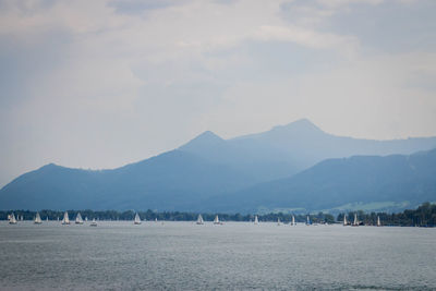 Scenic view of landscape and mountains against sky