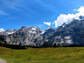 Scenic view of snowcapped mountains against sky