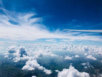 Aerial view of cloudscape against blue sky