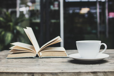 Close-up of coffee cup on table