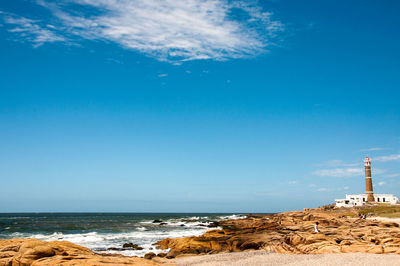 Scenic view of sea against blue sky