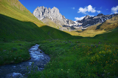 Scenic view of stream against sky