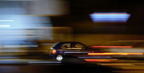 Light trails on road at night