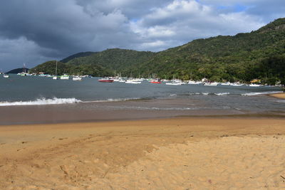 Scenic view of beach against sky