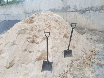 View of construction site on land against wall