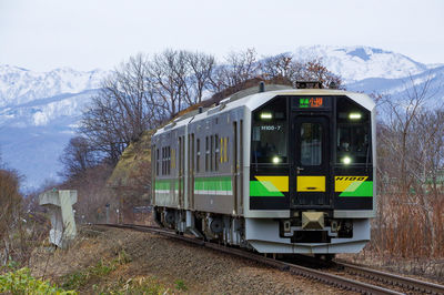 Winter mountain and local train
