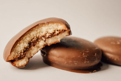 Close-up of biscuits against white background