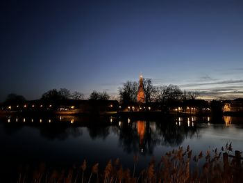 Reflection of illuminated city at night