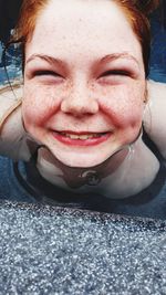 Close-up portrait of a smiling young woman