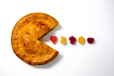 Close-up of bread against white background