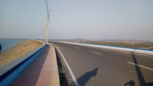 Road against clear sky