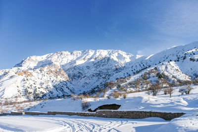 Chimgan ski resort in winter on a sunny clear day. chimgan mountain in uzbekistan