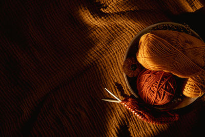 High angle view of mushrooms on jute