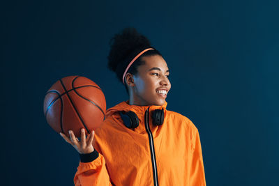 Young man playing basketball