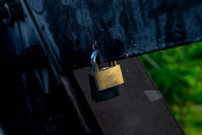 Man standing on railing against wall