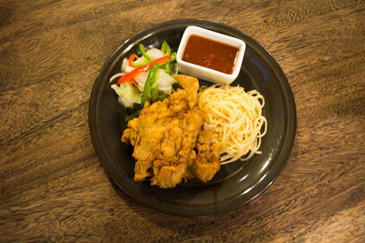 High angle view of food in plate on table