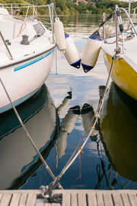 Boats moored in sea