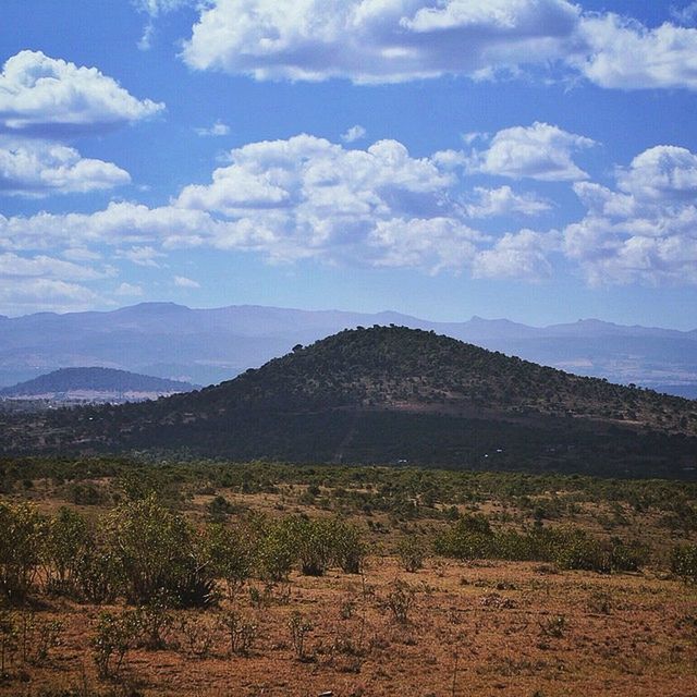 mountain, tranquil scene, landscape, sky, tranquility, mountain range, scenics, beauty in nature, cloud - sky, nature, cloud, non-urban scene, remote, horizon over land, idyllic, cloudy, countryside, outdoors, day, hill