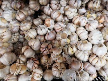 Full frame shot of onions for sale at market